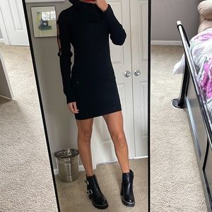 In new condition, used once! Black sweater dress